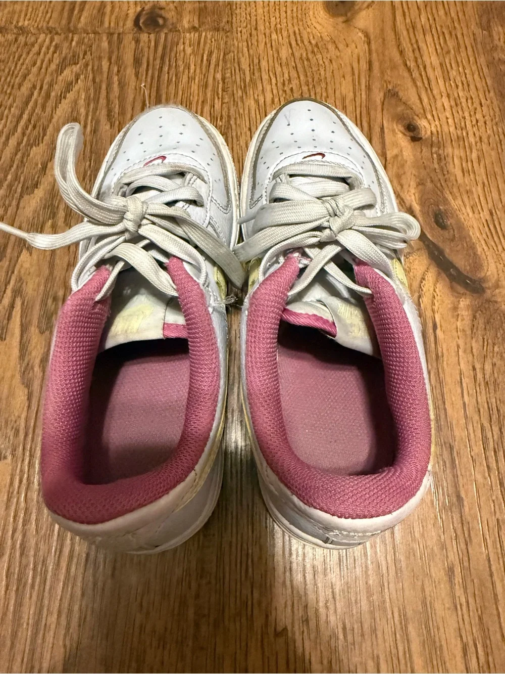 Nike Kids White Sneakers with Yellow Swoosh and Pink Lining